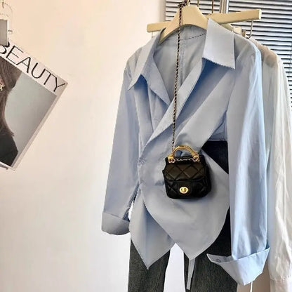 Designer's irregular long sleeved lapel shirt for women, waist cinching white, minimalist style basic top for women's shirt