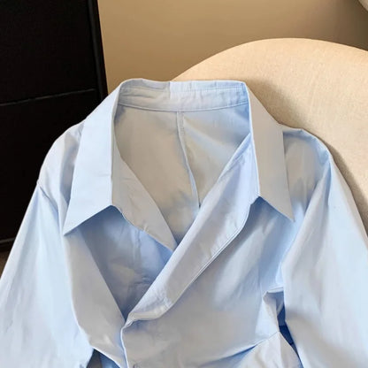 Designer's irregular long sleeved lapel shirt for women, waist cinching white, minimalist style basic top for women's shirt