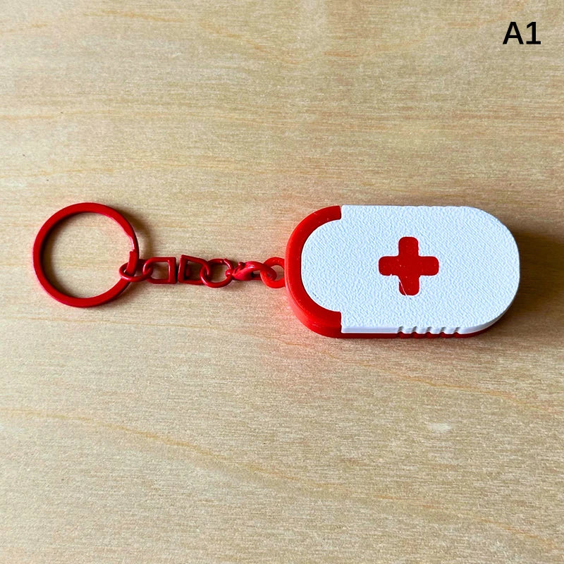 Mini Portable Plastic Pill Box with Keychain - Cross Symbol Medicine Case for Daily Use And Emergencies Sliding Capsule Holder