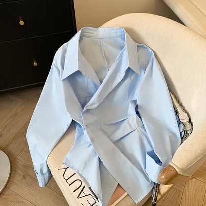 Designer's irregular long sleeved lapel shirt for women, waist cinching white, minimalist style basic top for women's shirt